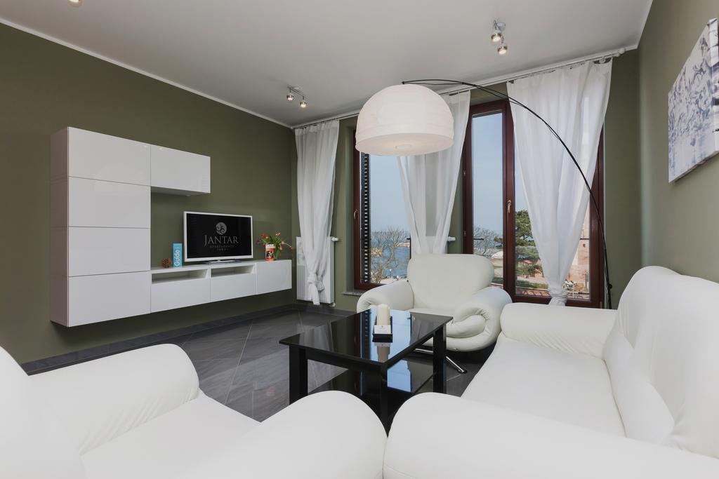 Jantar Apartamenty Deluxe Sea View كولوبرزيغ الغرفة الصورة